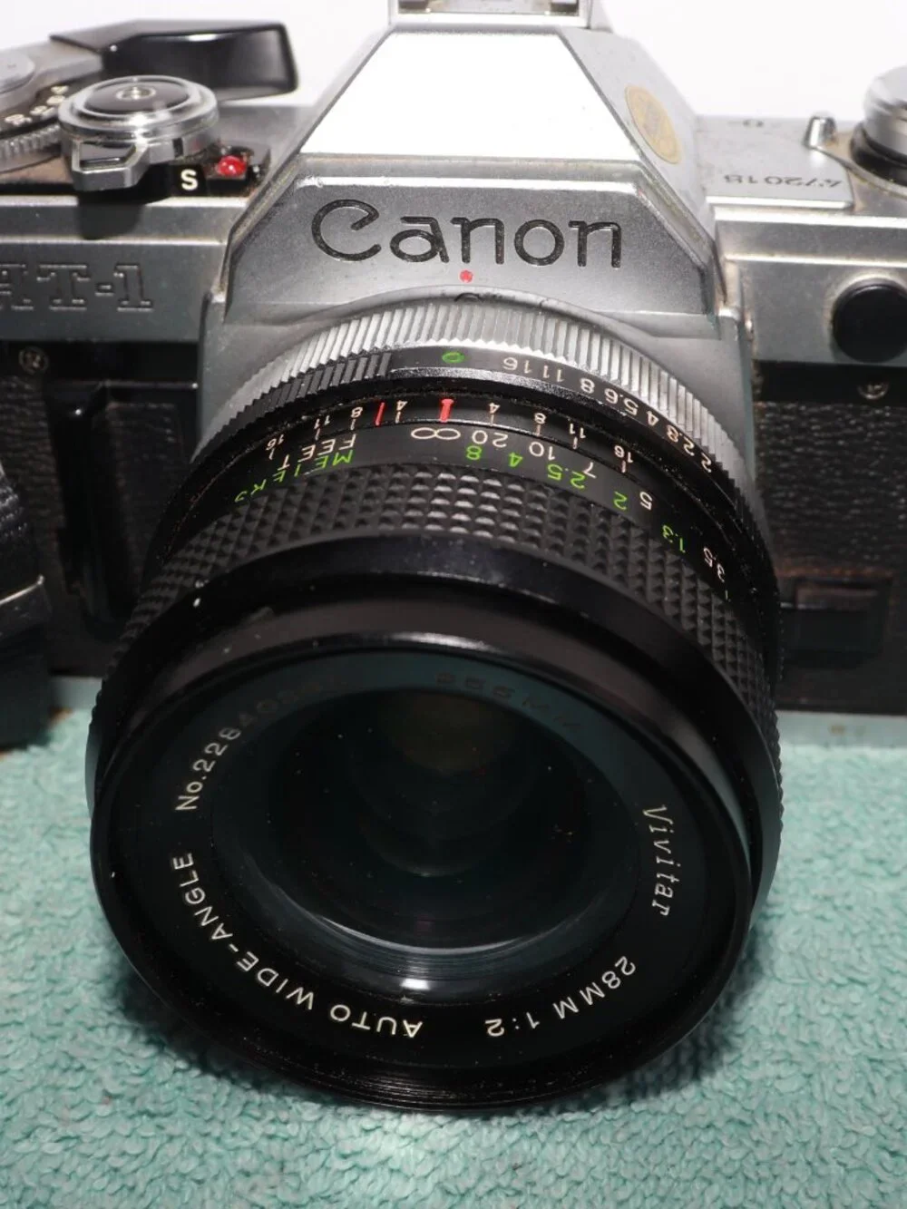Canon AT-1 35mm Film Camera W/Vivitar 55mm Lens for parts. Shutter Not Working.